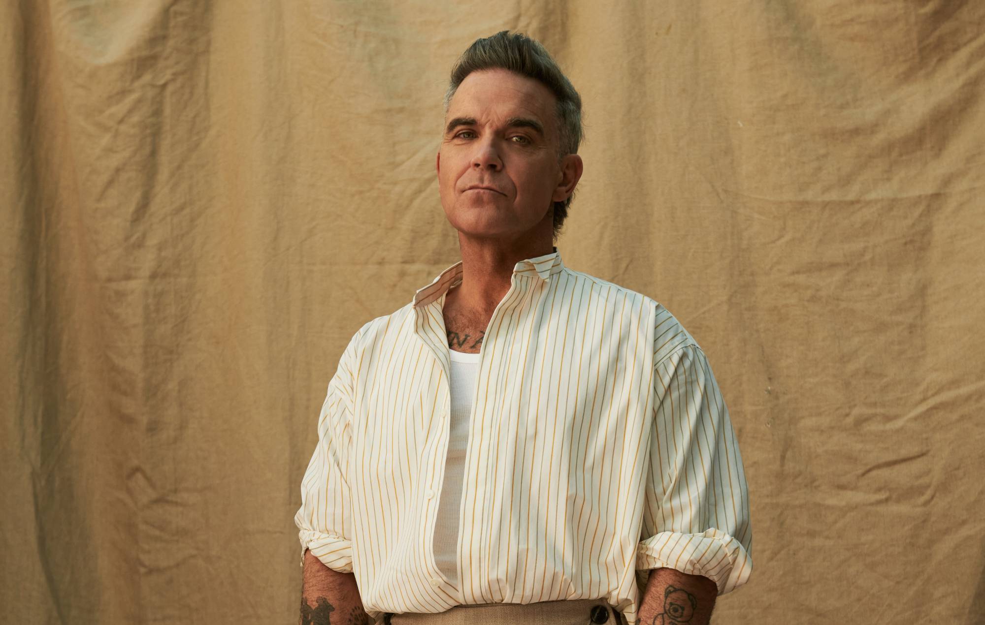 Il nuovo album di Robbie Williams presenta un co-write di Gary Barlow sullo stalker di Morrissey
