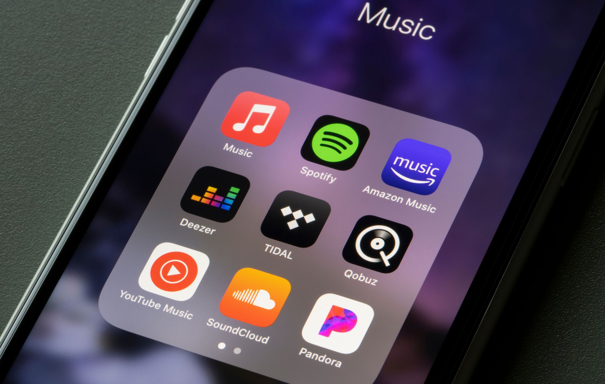 Assorted music streaming apps on an iPhone